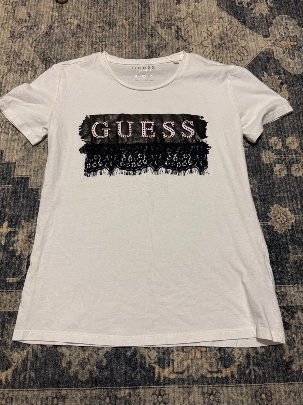 Guess White Short Sleeve Tee with Black Lace Logo and Pink Accent